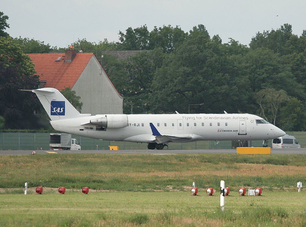 Cimber Air Canadair Regjet CRJ100LR OY-RJI kurz vor dem Start in Berlin-Tegel am 18.06.2011. Hier in Diensten von SAS.