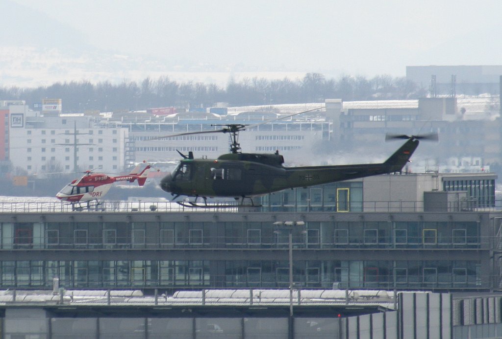 Deutsche Rettungsflugwacht (German Air Rescue) Eurocopter BK 117A4 D-HDRF und Germany Army Bell UH-1D 23+30 am 10.03.2010 auf dem Flughafen Stuttgart