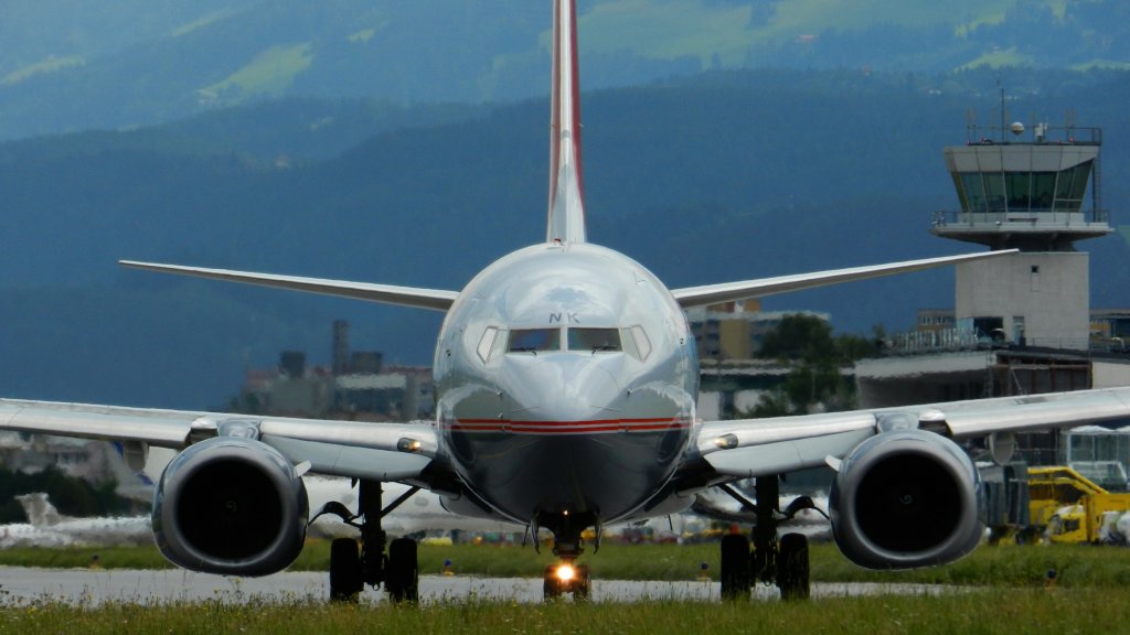 INN Innsbruck-Kranebitten, Austria,
23. Juli 2011, 
Lauda Air  Boeing 737-8Z9,
OE-LNK, taxiing alpha, Rwy 08 to AYT (Antalya)
