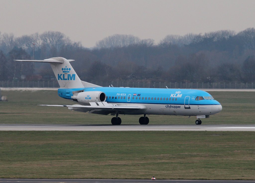KLM-Cityhopper Fokker 70 PH-WXA bei der Ankunft in Dsseldorf am 11.03.2013