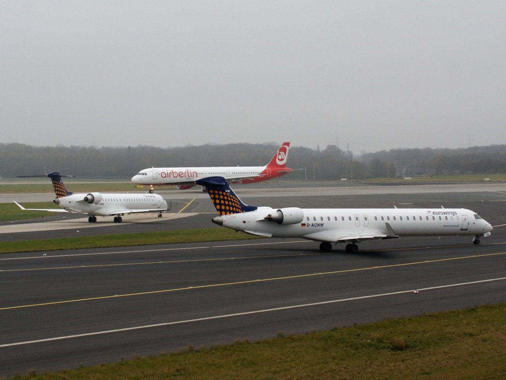 Lufthansa Regional (Eurowings), D-ACNW  ohne Namen , Bombardier, CRJ-900 NG (Warteposition vor dem Start), 13.11.2011, DUS-EDDL, Dsseldorf, Germany 