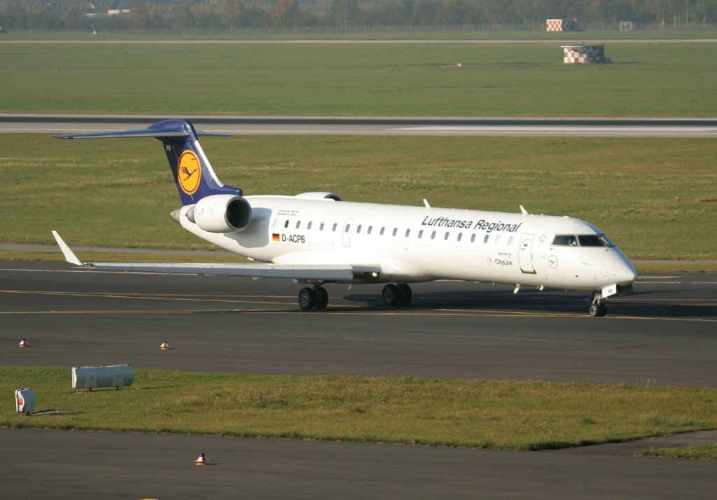 Lufthansa Regional(CityLine) Canadair Regjet CRJ701ER D-ACPB  Rdesheim am Rhein  auf dem Weg zum Start in Dsseldorf am 31.10.2011