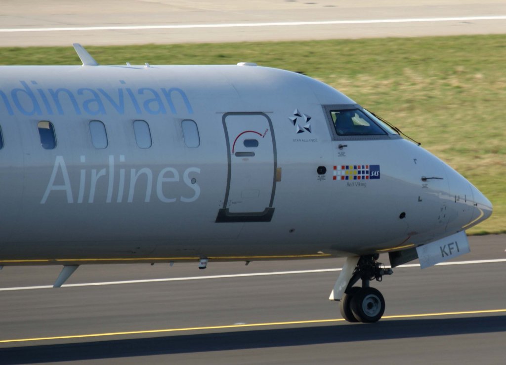 SAS, OY-KFI, Bombardier CRJ-900 (Nase/Nose), 20.03.2011, DUS-EDDL, Dsseldorf, Germany