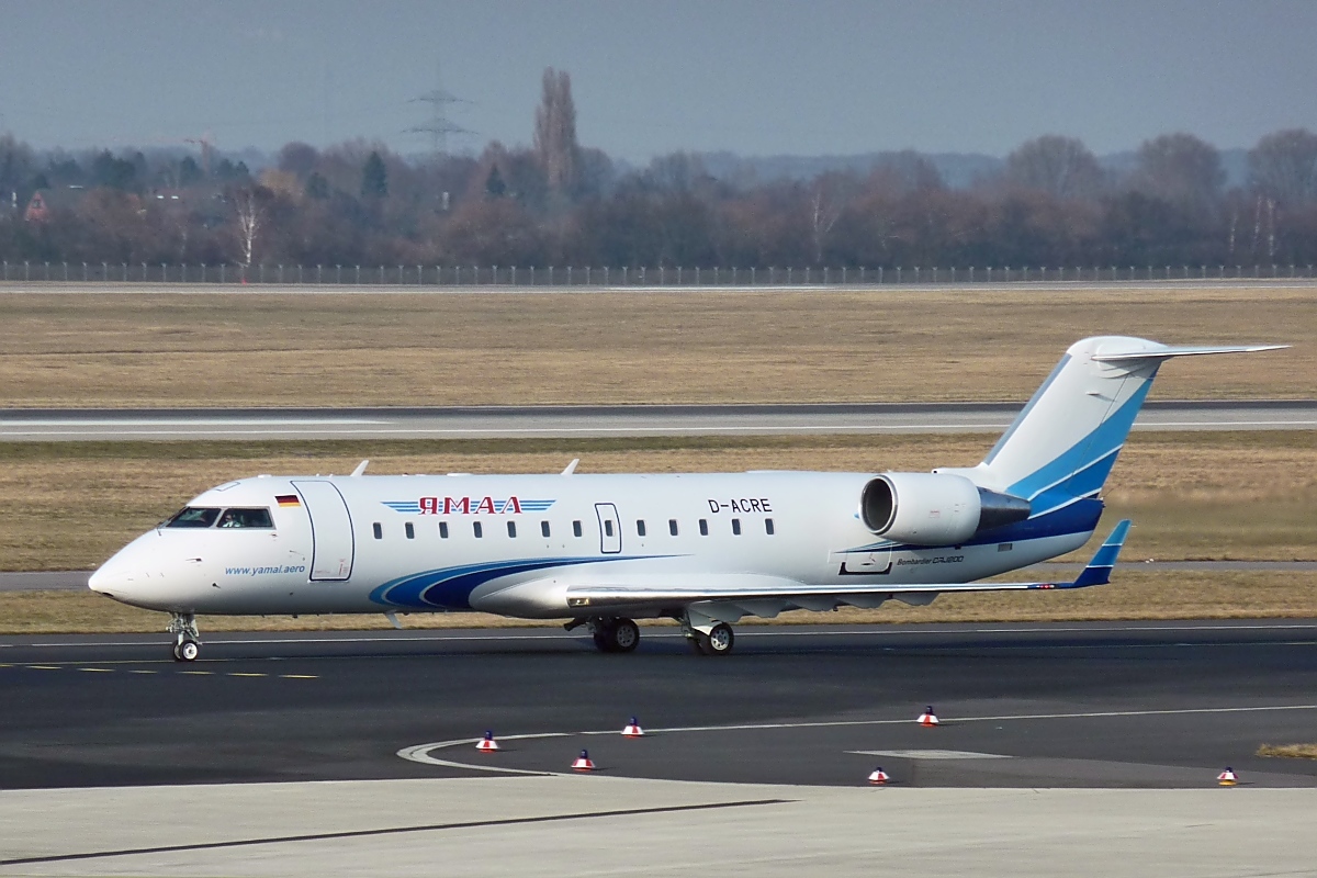 D-ACRE, Canadair Regional Jet CRJ 200 ER, fliegt jetzt fr Yamal Airlines. DUS, 8.2.12