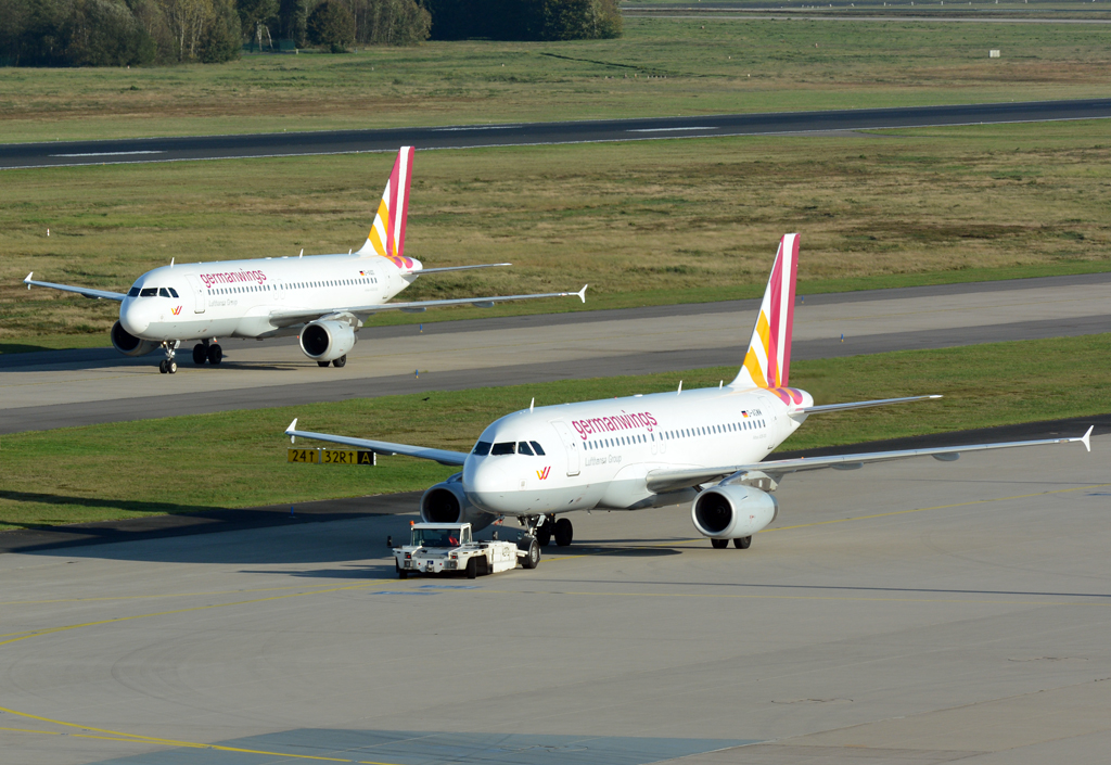 Germanwings im Doppelpack, A 320-200 D-AIQS und A 319-100 D-AGWM am Flughafen CGN - 19.10.2014