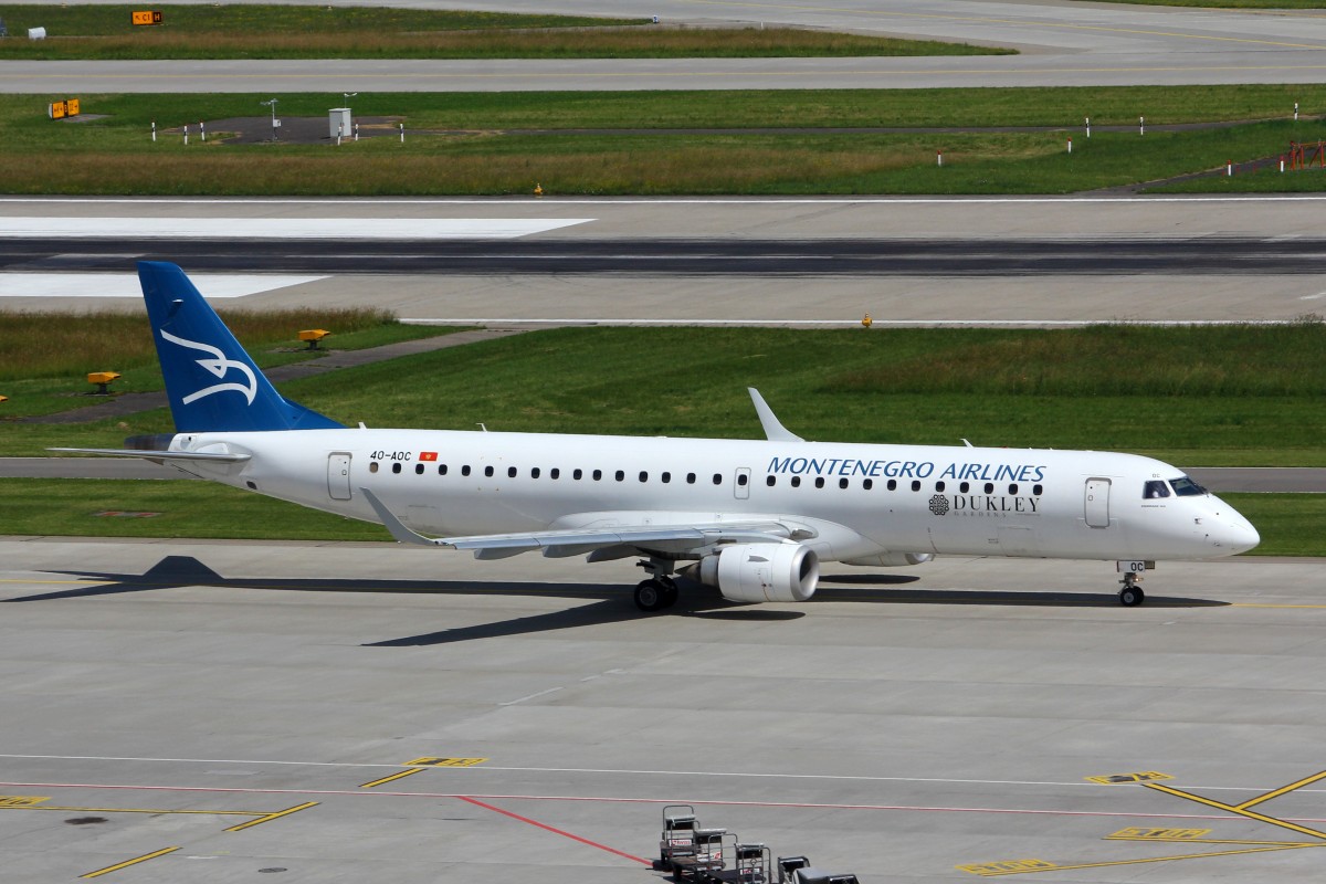 Montenegro Airlines, 4O-AOC, Embraer EEJ-195LR, 19.Juni 2015, ZRH Zürich, Switzerland. Mit Dukley Sticker.