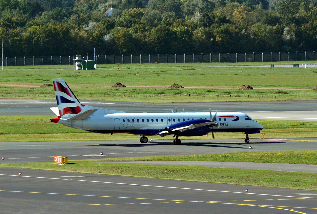 Saab 2000 British Airways, G-CDEB, taxy at DUS - 01-10-2015
