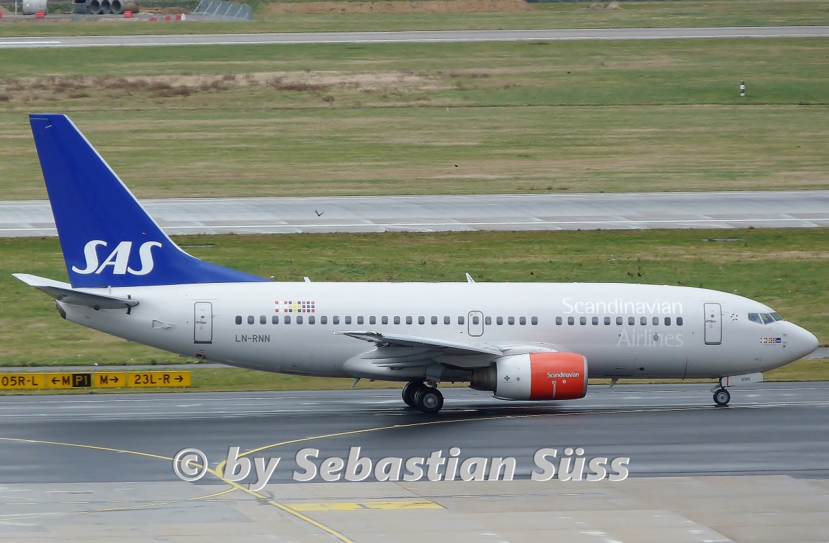 Scandinavian Airlines System B737-600 LN-RNN on the way to rwy 23L at Dusseldorf. 6.4.14