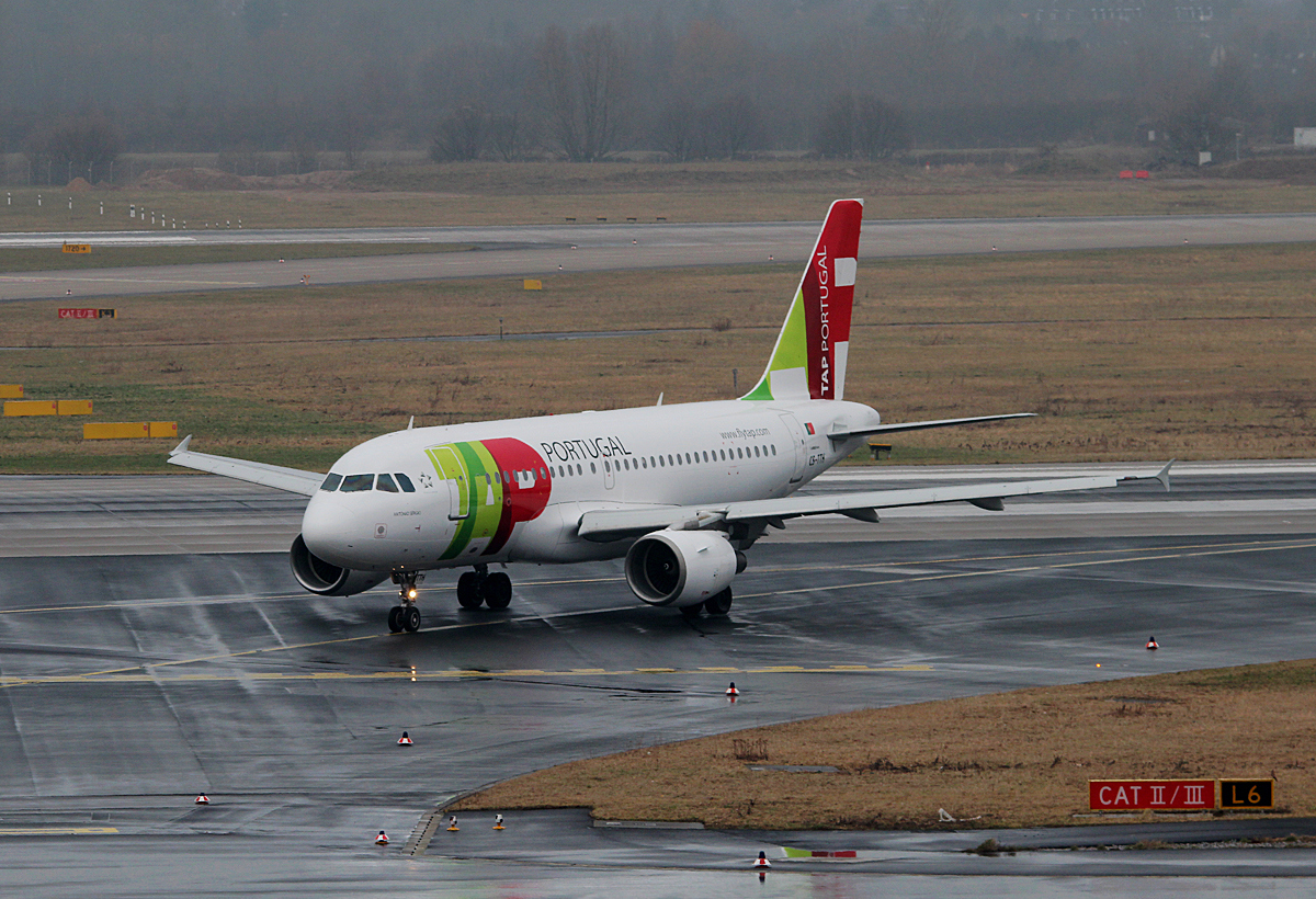 TAP A 319-111 CS-TTH bei der Ankunft in Dsseldorf am 10.03.2015