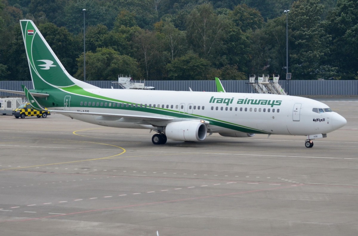 YI-ASE Iraqi Airways Boeing 737-81Z (WL)   zum Gate in Tegel am 12.09.2014