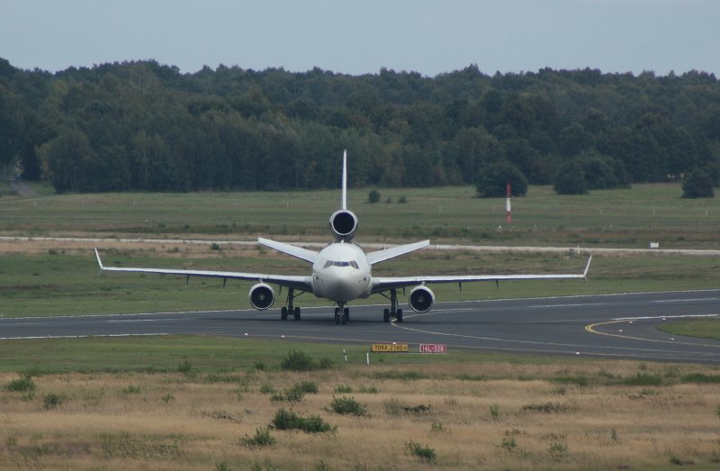 MD-11F is coming down from Runway. Kln/Bonn 06.09.2009.