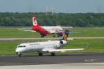 Begegnungen: Lufthansa Regional D-ACPC  Espelkamp  , Canadair Regional Jet CRJ-701ER, und eine Maschine der Air Berlin, in DUS am 6.9.10