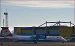 Austrian OE-LGF, Dash 8 steht auf Vorfeld der Maribor Flughafen MBX. /27.1.2016