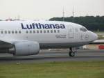 Die Lufthansa Boeing 737-300  Bad Kissingen  rollt in Dsseldorf zum Start am 14.07.2008.