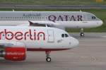 Qatar und Air Berlin-Airbus A319-100 in Berlin-Tegel am 19.08.10