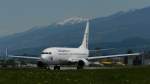 INN Innsbruck-Kranebitten, Austria,
8. Mai 2011, 
SunExpress  Boeing 737-8HC,
TC-SNF, taxiing alpha, Rwy 08 to AYT (Antalya)
