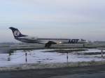 LOT Embraer ERJ-145MP SP-LGG am frhen Morgen des 08.01.2011 auf dem Flughafen Berlin-Tegel