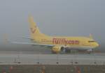 berlin-tegel-txl Tuifly B 737-7K5 D-AHXG im morgentlichen Nebel am 27.09.2008 auf dem Flughafen Berlin-Tegel