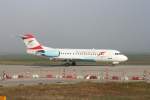 berlin-tegel-txl Austrian Arrows Fokker 70 OE-LFG im morgentlichen Nebel auf dem Flughafen Berlin-Tegel am 27.09.2008