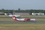 Air Berlin-Dash 8-402Q beim Start in Berlin-Tegel, im Hintergrund eine ... Air Berlin-Dash 8-402Q beim Start in Berlin-Tegel, im Hintergrund eine ...