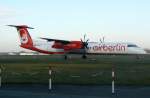 berlin-tegel-txl Air Berlin De Havilland Canada DHC-8-402Q D-ABQC am fr�hen Morgen des 21.11.2009 auf dem Flughafen Berlin-Tegel