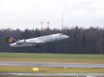 hamburg-ham Lufthansa City Line, Bombardier CRJ200 LR, D-ACJG auf dem Hamburger Flughafen. Aufgenommen am 13.12.09.