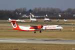 dusseldorf-dus Die De Havilland Dash 8-400 D-ABQI von Air Berlin bei der Landung in D�sseldorf am 9.3.2010. Im Hintergrund sind u.a. zwei A320 der insolventen Bluewings zu sehen.