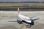Der A319 G-EUOD von British Airways beim Pushback in D�sseldorf. ...