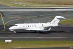 dusseldorf-dus Challenger 300 Ra-67217 der Tulpar Air rollt am 9.3.2010 zum Parkbereich in D�sseldorf
