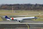 OY-KFD (CRJ-900) der SAS setzt in D�sseldorf auf. (9.3.2010)  ...