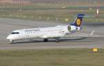 berlin-tegel-txl Lufthansa Regional (Cityline) Canadair Regjet CRJ701ER 'R�desheim a. Rhein' D-ACPB bei der Amkunft in Berlin-Tegel am 02.04.2010