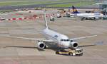 A 320-232 der Aegean Airlines beim pushback am Vorfeld in ... A 320-232 der Aegean Airlines beim pushback am Vorfeld in ...