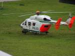 Eine BK-117 der Polizei grade nach dem Landen an ihrem ...