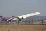 A 340-600 von Thai ...  G�nter Malzacher 10.03.2011