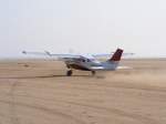 Cessna 206 Cessna 206 V5-NSK beim Start mit 6 Fallschirmspringern in Swakopmund/Namibia am 2.9.2009