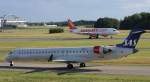 Scandinavian Airlines (SAS),OY-KFK,Danadair Regional Jet CRJ900ER,24.06.2011,HAM-EDDH,Hamburg,Germany, landet easyJet,G-EZTH,Airbus A320-214  ...
