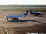 1XX Eine Embraer der Finnair im Hintergrund ein Jet der SN Brussel Airlines am 27.03.07