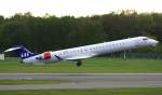 SAS Scandinavian Airlines,OY-KFI,(c/n 15242),Canadair ...  Henryk Konrad 03.05.2012