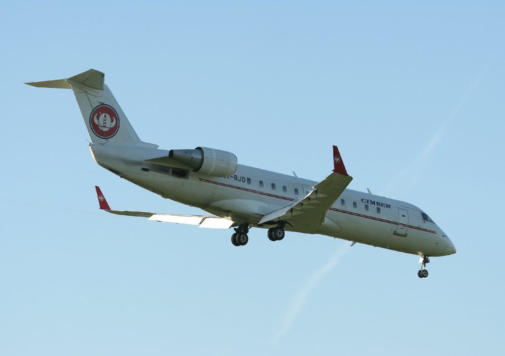 Cimber Air Canadair Regjet CRJ100LR OY-RJD kurz vor der Landung in Berlin-Tegel am 24.09.2011