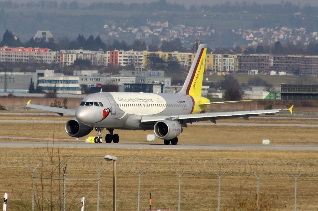 Der Airbus A319-112 der Germanwings D-AKNM trgt durch ganz Europa die Werbung  Mmhh Baden Wrttemberg . Hier rollt er gerade Aus nach der Landung in Stuttgart auf dem Runway 25 (26.02.11)