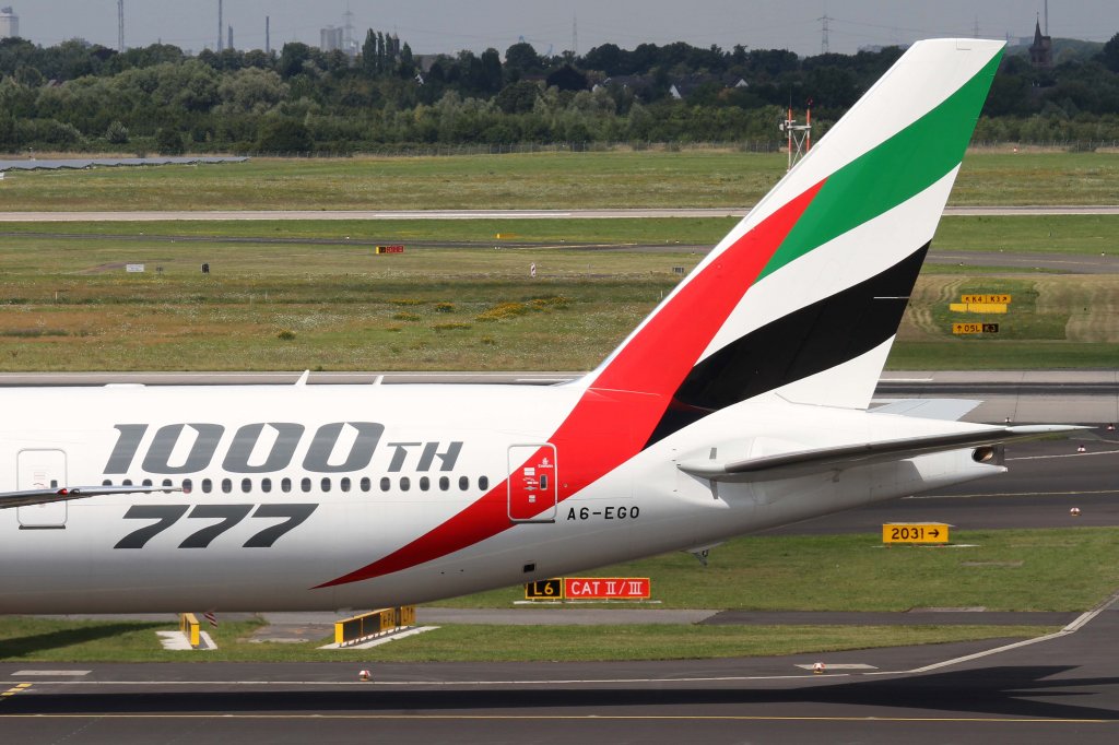 Emirates, A6-EGO, Boeing, 777-300 ER (Seitenleitwerk/Tail ~ 100oth-777 Sticker), 11.08.2012, DUS-EDDL, Dsseldorf, Germany 

