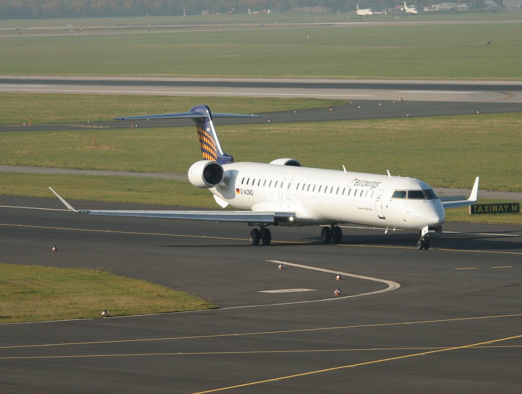 Lufthansa Regional(Eurowings) Canadair Regjet CRJ900NG D-ACNQ auf dem Weg zum Start in Düsseldorf am 31.10.2011
