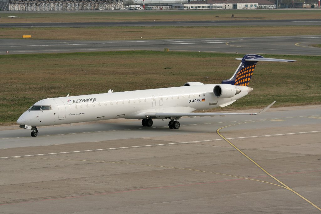 Lufthansa Regional(Eurowings) Canadair Regjet CRJ900NG D-ACNK bei der Ankunft in Berlin-Tegel am 15.04.2012