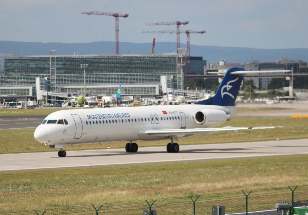 Montenegro Airlines Fokker 100 4O-AOT am 16.08.2012 auf dem Flughafen Frankfurt am Main