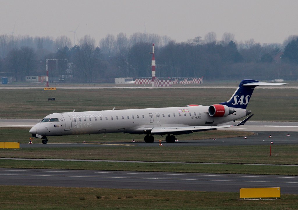 SAS Canadair Regjet CRJ900ER OY-KFK bei der Ankunft in Dsselsorf anm 11.03.2013