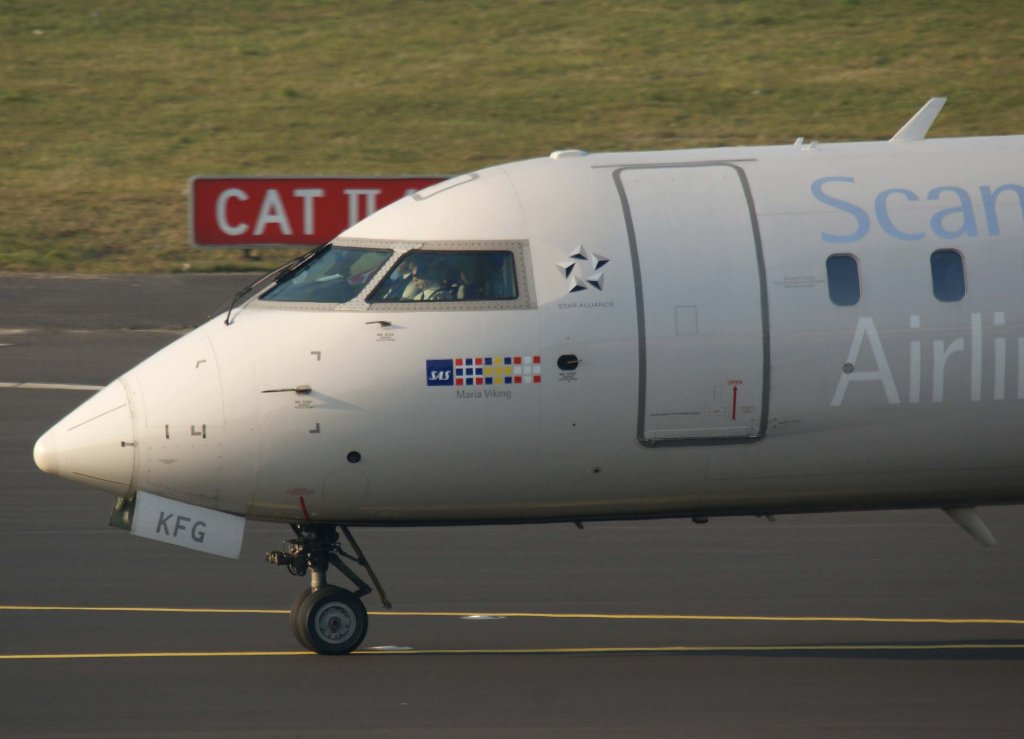 SAS (DK), OY-KFG, Bombardier CRJ-900  Maria Viking  (Nose/Nase), 04.03.2011, DUS-EDDL, Dsseldorf, Germany 

