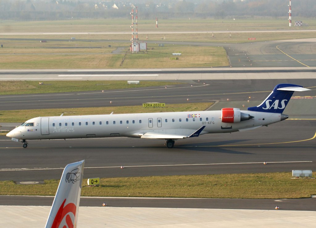 SAS (DK), OY-KFG, Bombardier CRJ-900  Maria Viking , 04.03.2011, DUS-EDDL, Dsseldorf, Germany 

