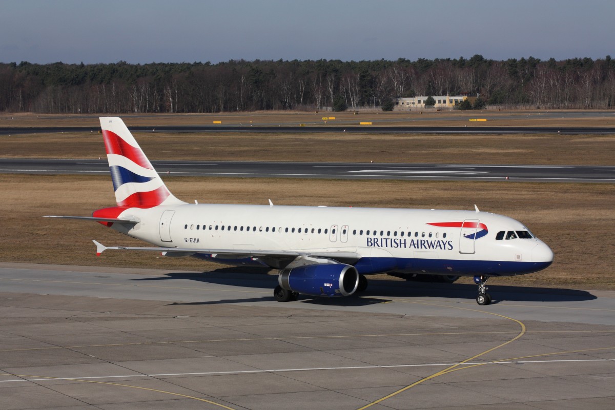 A320 der British Airways (G-EUUI) rollt in Berlin-Tegel zu seiner Parkposition. Fotografiert am 23.02.2014. 