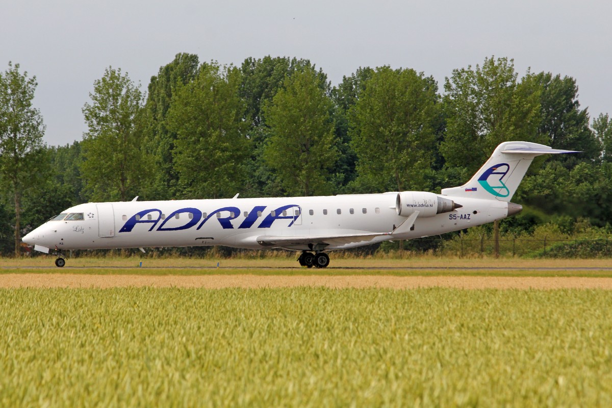 Adria Airways, S5-AAZ, Bombardier CRJ-701ER, 5.Juli 2015, AMS Amsterdam, Netherlands.