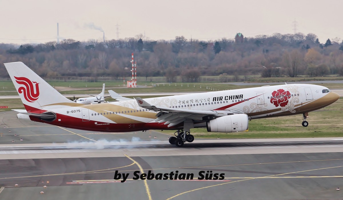 Air China A332 B-6075 is touching down on rwy 05R at Dusseldorf. 6.4.15